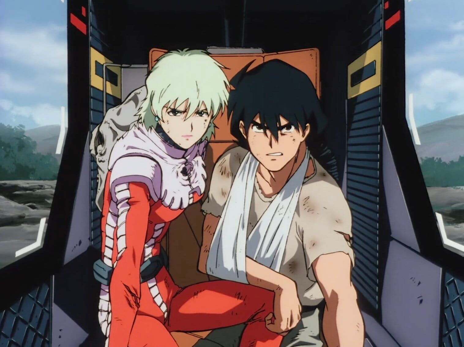 Still from Mobile Suit Gundam: The 08th MS Team of Shiro and Aina in the cockpit of a Gundam